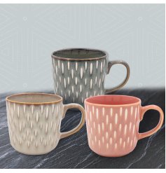 Delightful coffee mug with a stylish patterned glaze finish.