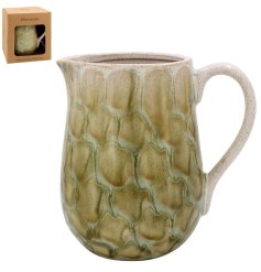 A charming green tortoise shell jug 