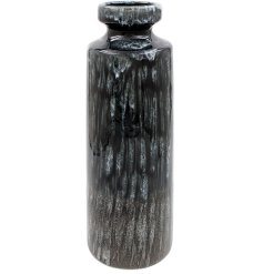 The Reactive Glaze Vas offers a distinctive finish with vibrant colors and textured details.