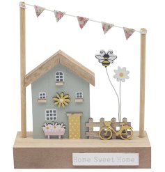 A delightful wooden sign featuring the message "Home Sweet Home."