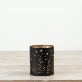 Delightful candle holder with elegant cut-out design.