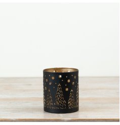 Charming candle holder with elegant cut-out design.