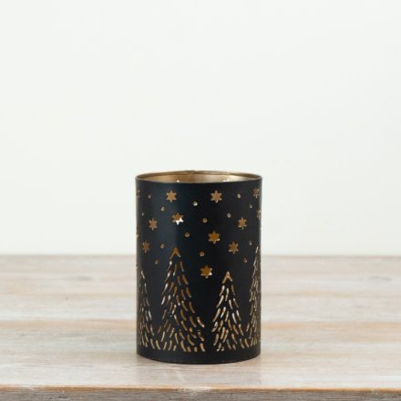 A delightful lantern with intricate cut-out design.