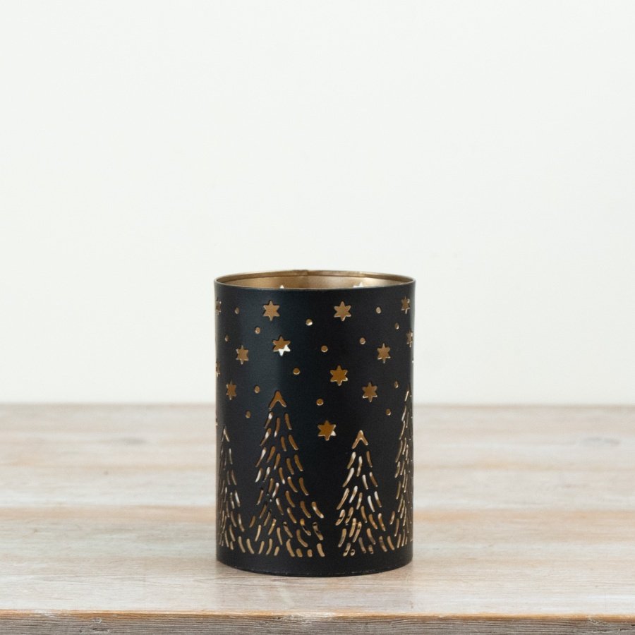 A delightful lantern featuring elegant cut-out designs.