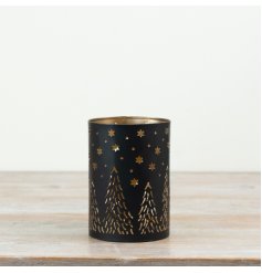 A delightful lantern with intricate cut-out design.