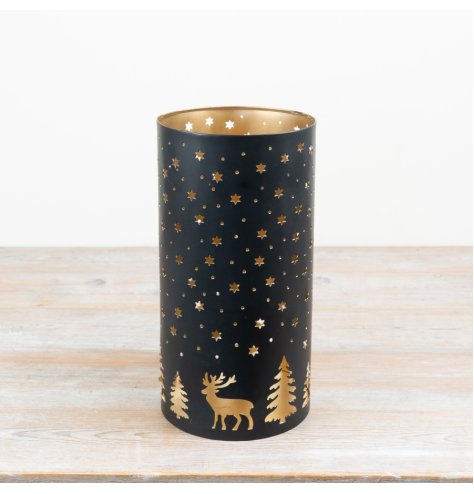 Add charm to your space with this stylish black and gold iron votive holder.