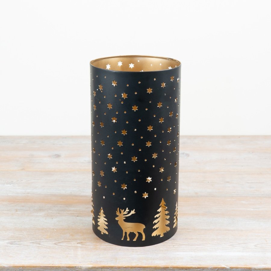 Enhance your décor with this stylish black and gold iron votive holder.