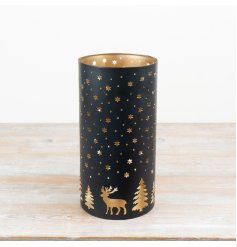 Add a touch of elegance with this black and gold iron votive holder for any room.