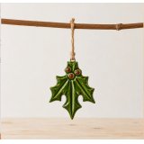 Add a timeless, festive touch to your mantelpiece or sideboard with this charming holly adornment