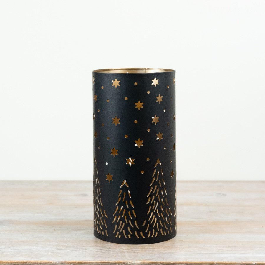 Elegant black and gold candle holder with stylish cut-out design.