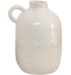 A stoneware jug-style vase with a soft rounded shape, subtle speckled glaze and practical side handle
