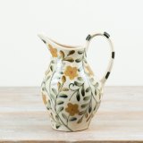 Add a sunny smile to your space with this charming yellow flower design ceramic vase