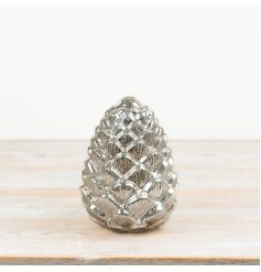 Illuminated glass pinecone decor that glows beautifully.