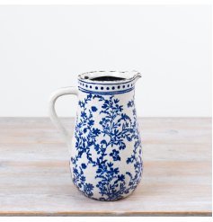 Classic blue & white ceramic jug featuring a floral pattern inspired by traditional European pottery.