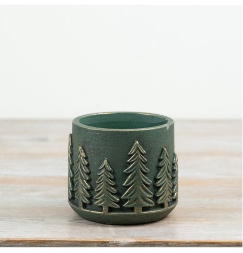 Enhance your plants with this stylish cement tree planter, adding texture and charm to any space.