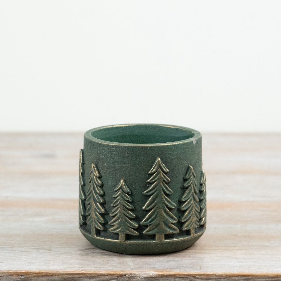 Add depth and character to your plant offering with this decorative cement tree planter.