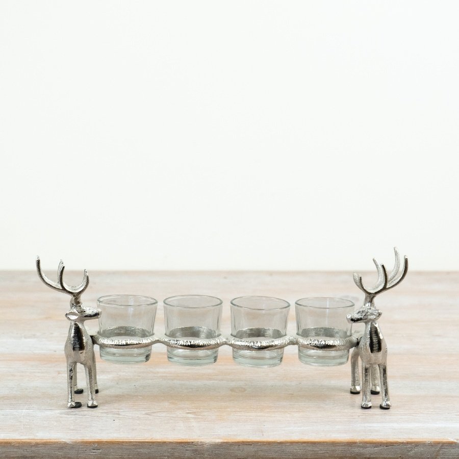 Introduce a touch of refined woodland charm to seasonal ranges with this striking four-cup stag t-light holder.