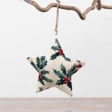 A beautifully shaped metal star finished with a festive holly and berry print.