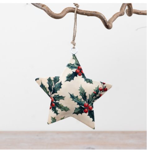 A beautifully shaped metal star finished with a festive holly and berry print.
