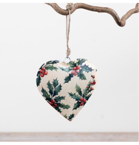 A charming heart-shaped metal decoration finished with a traditional holly and berry pattern. 