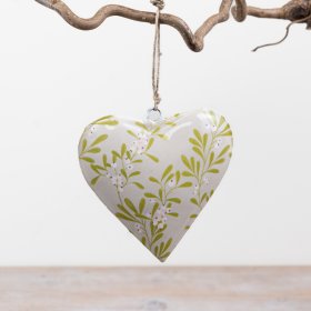 Elegant iron mistletoe heart to add festive charm and seasonal warmth