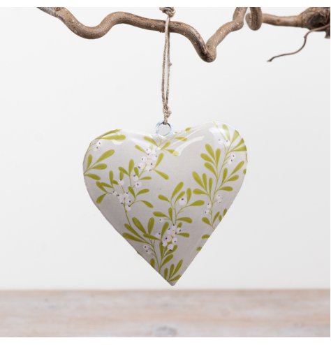 Elegant iron mistletoe heart to add festive charm and seasonal elegance