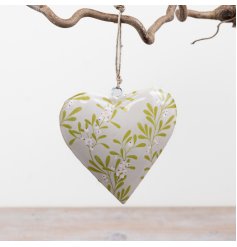 Elegant iron mistletoe heart adding festive charm and seasonal warmth to your space