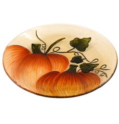 A highly decorative glass plate in rich orange and green colours. A must have seasonal accessory. 