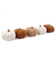 A cosy pumpkin style draft excluder in rich earthy colours. Beautifully textured adding warmth to the home. 