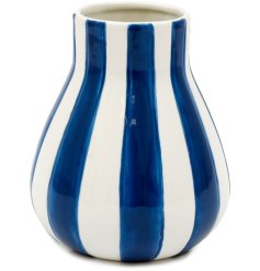 A stylish, coastal inspired vase with a bold blue and white stripe design. 