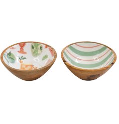 Charming serving bowl crafted from enamel and wood for stylish presentation.