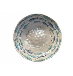 A charming glazed bowl with a repeat sardine pattern. 