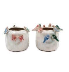 A mix of 2 glazed planters featuring vibrant butterflies and birds for a beautiful touch.