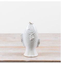 Charming porcelain fish vase in white perfect for fresh blooms or adding nautical elegance 