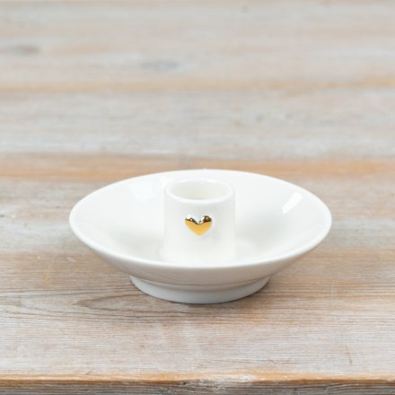 a charming candle holder adored with a gold heart 