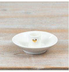 a charming candle holder adored with a gold heart 