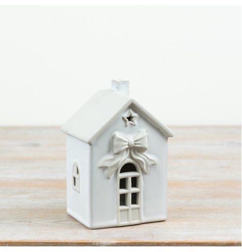 Light up your space with this stylish, cordless LED house—charming and elegant for any room.