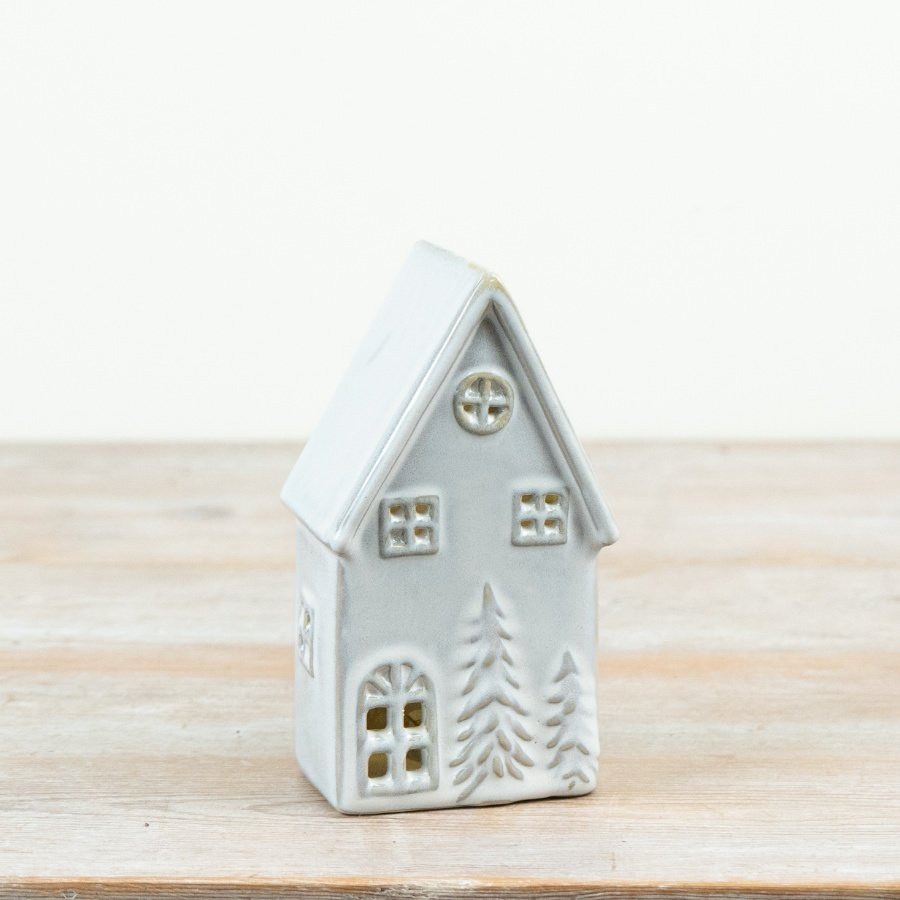 Charming LED house light, operated by 3 LR44 batteries for a delightful glow.