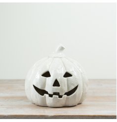 Add a charming autumnal touch to your Halloween decor with this terracotta pumpkin