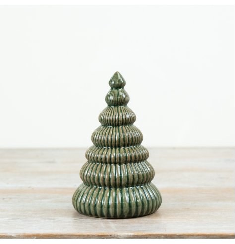 Bring warm, classic charm to your holiday decor with this cozy, traditional accent piece.