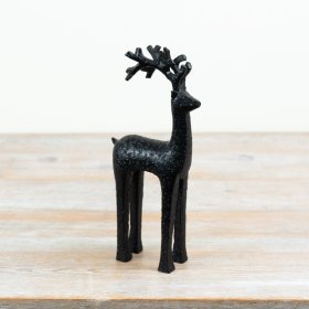 Bring woodland charm to your space with this elegant deer decor piece.