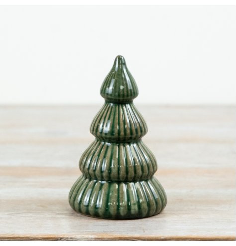  charming ceramic Christmas tree finished in a rich green glaze with layered ribbed detailing for added texture.