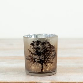 Create a soft, ambient glow with this beautifully finished frosted glass t-light holder.