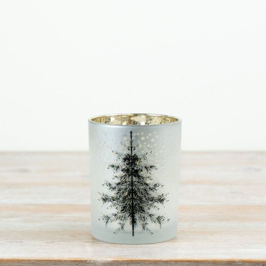 Bring soft, seasonal ambience to your collection with this elegant Christmas tree t-light holder.