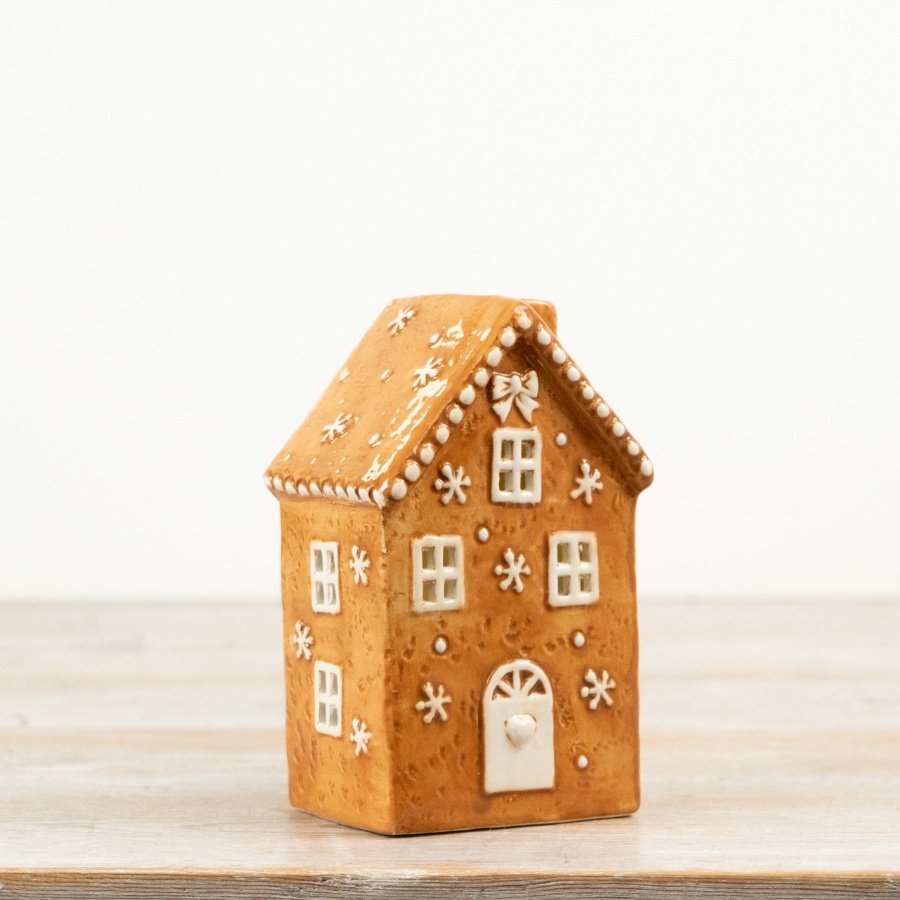 Designed with traditional gingerbread styling and decorative icing accents