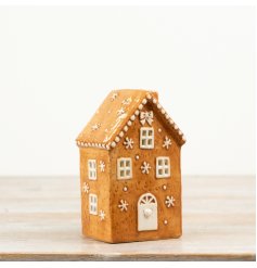 This 15cm LED gingerbread house features charming icing-style detailing and warm internal lighting for a cosy glow
