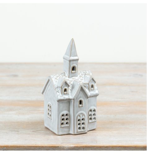 A charming ceramic church decoration finished in a soft natural glaze.