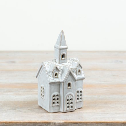 A charming ceramic church decoration finished in a soft natural glaze.