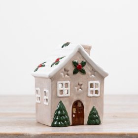 Festive Christmas candle house decoration ornament.