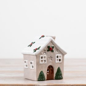 Bring charm to your home with this stylish Dolomite candle house.
